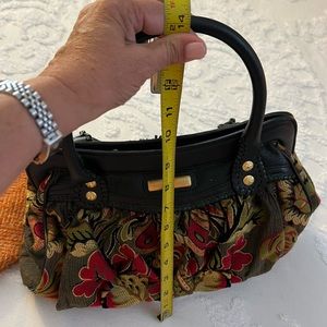 Isabella Fiore Satchel in red, green & black tapestry. Gold accents on outside.